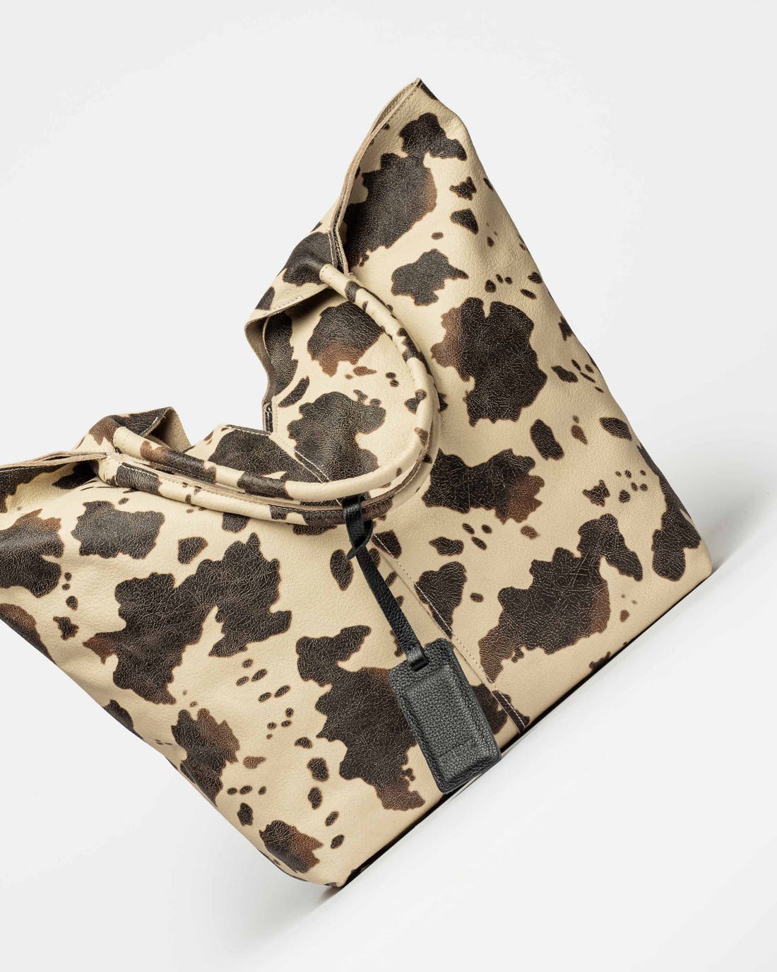 Bolsillo Loto de piel de vaca repujada