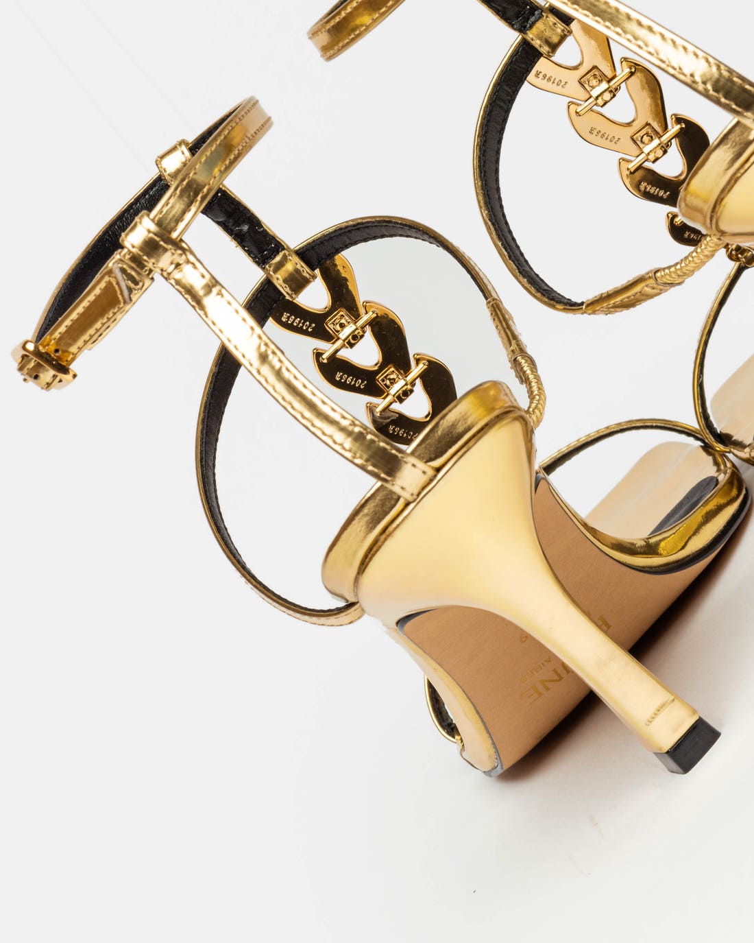 Sandalias altas Goldie en piel metalizada